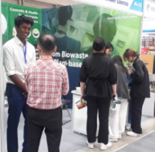 Kaushik at the BUYO booth at a trade conference