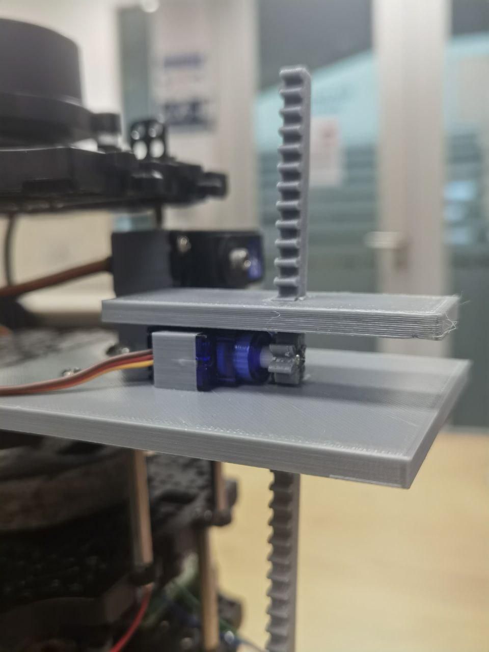 Rack and pinion mounted on the robot